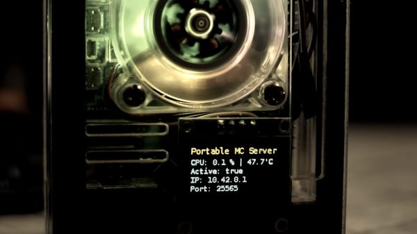 Raspberry Pi 5 with a case and a screen showing the Minecraft Server data